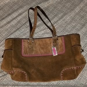 Leather Coach purse with pink lining